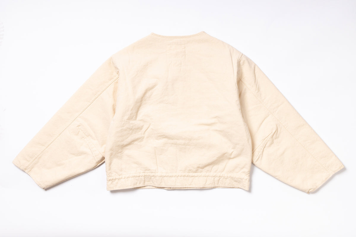 Beige jacket on a white background