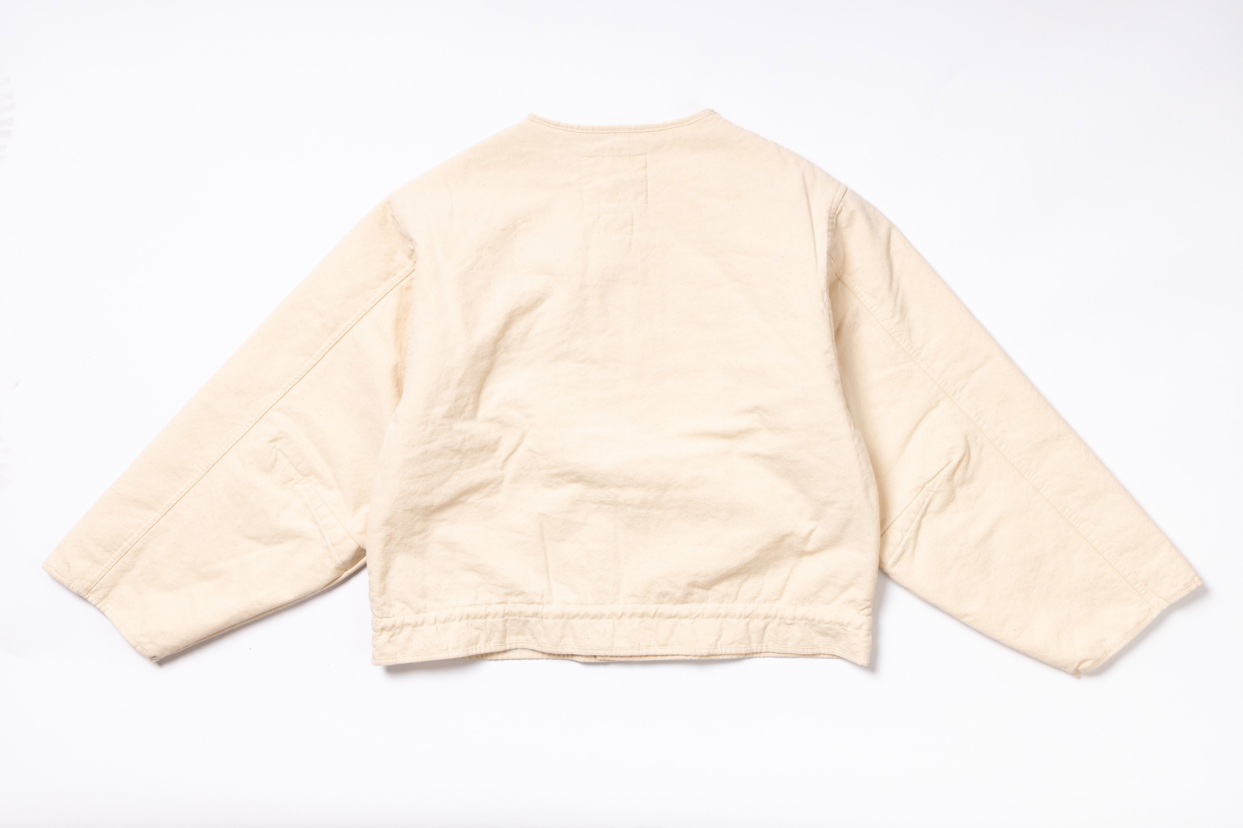 Beige jacket on a white background