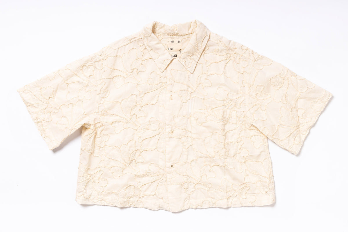 Beige textured shirt on a white background