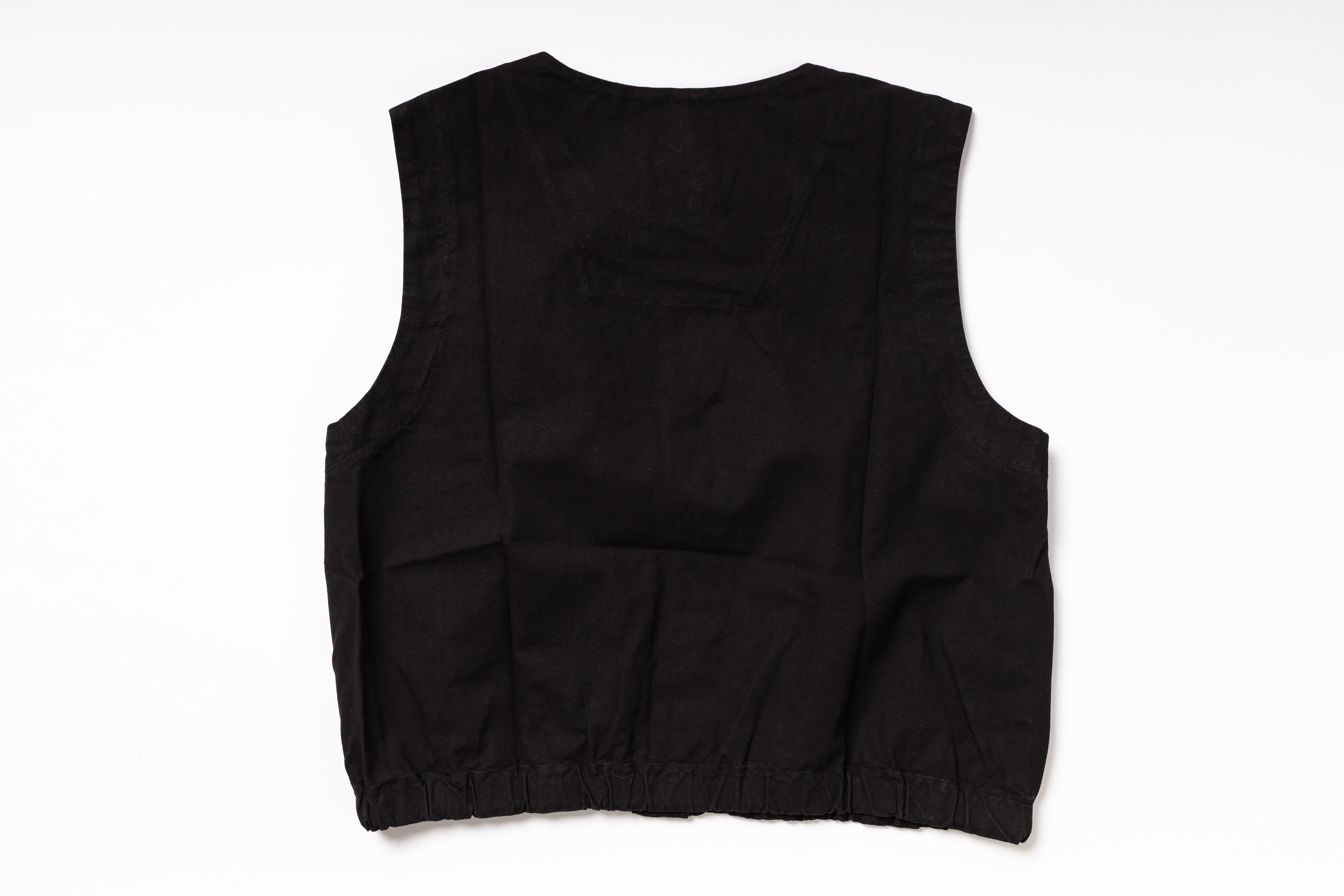Black vest on a white background