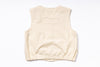Beige sleeveless top on a white background
