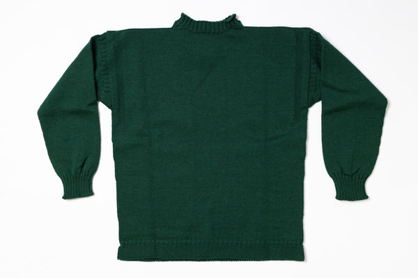 Green sweater on a white background