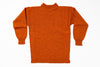 Orange sweater on a white background