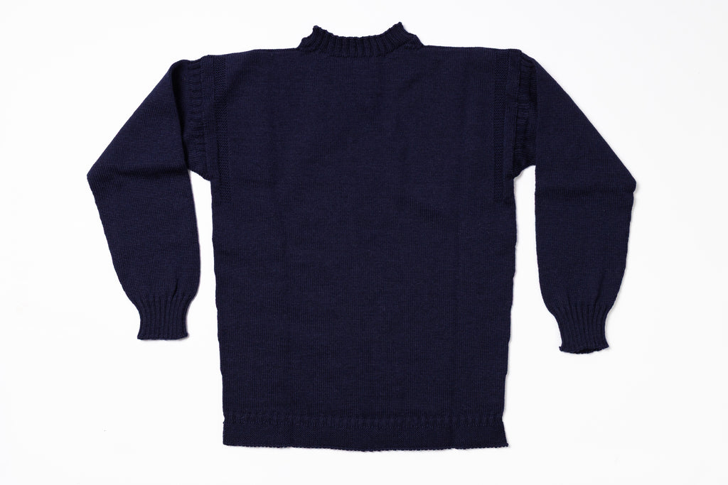 Navy blue sweater on a white background