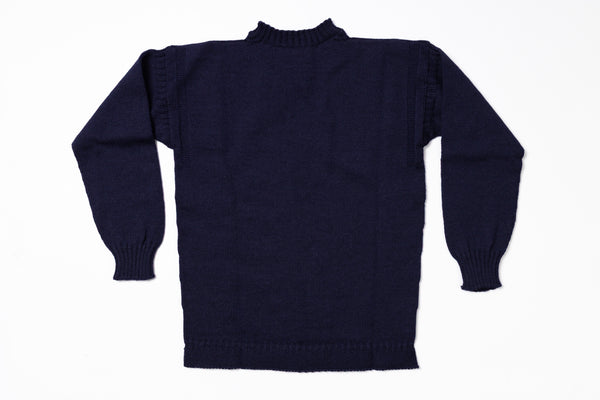 Navy blue sweater on a white background