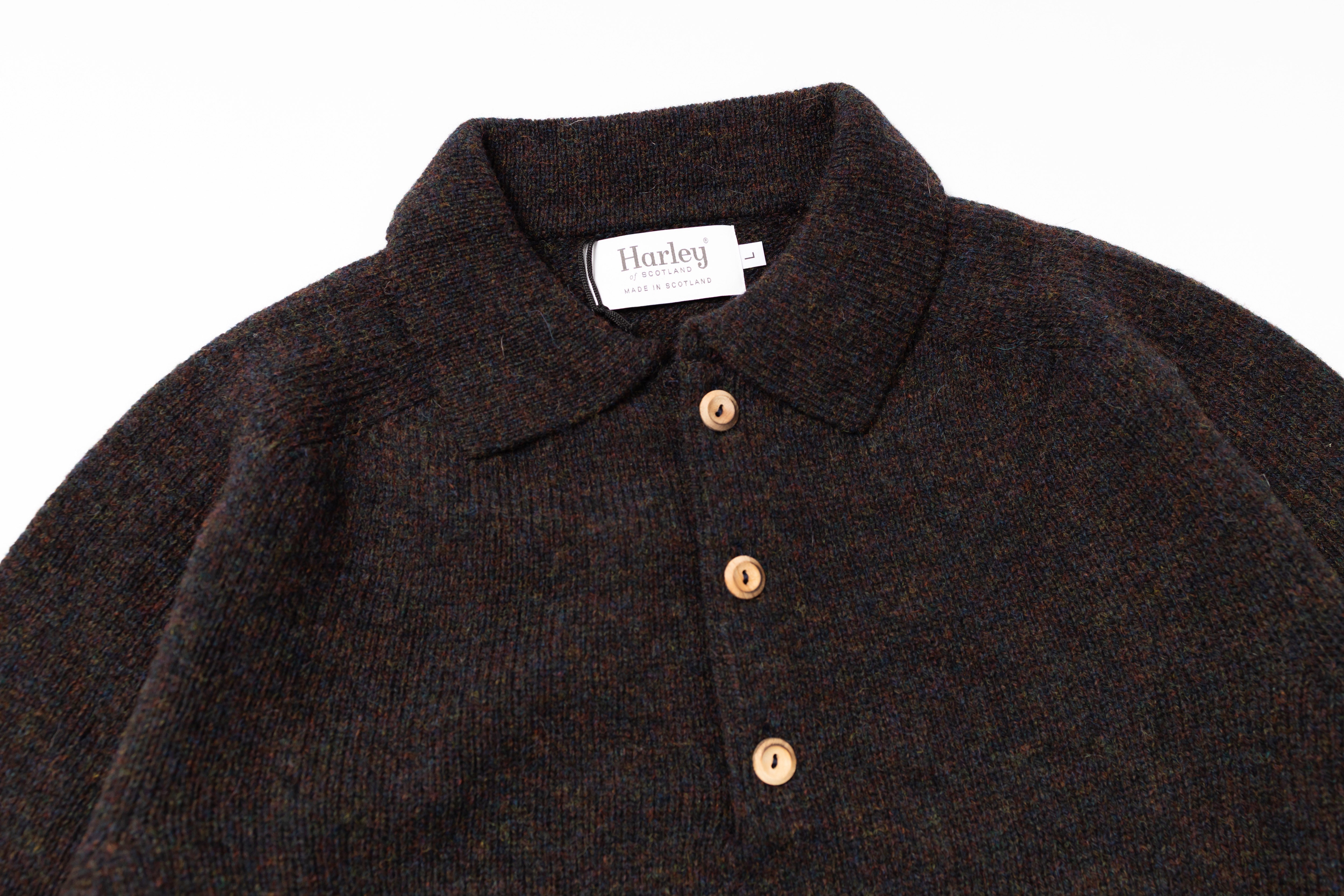 Dark Polo Sweater with Harley label on a white background 