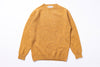 Yellow sweater on white background