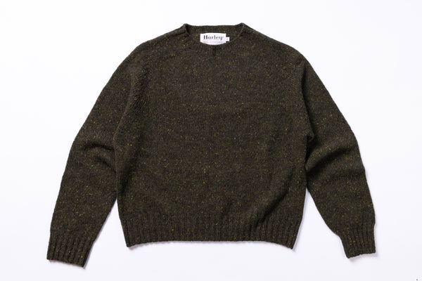 Dark Green sweater with 'Harley' label on a white background