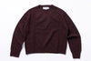 Burgundy sweater with 'Harley' label on a white background
