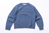 Light blue sweater with 'Harley' label on a white background