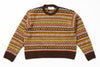 Patterned sweater with brown trim on a white background