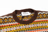 Knitted sweater with a colorful pattern and Harley brand label on a white background