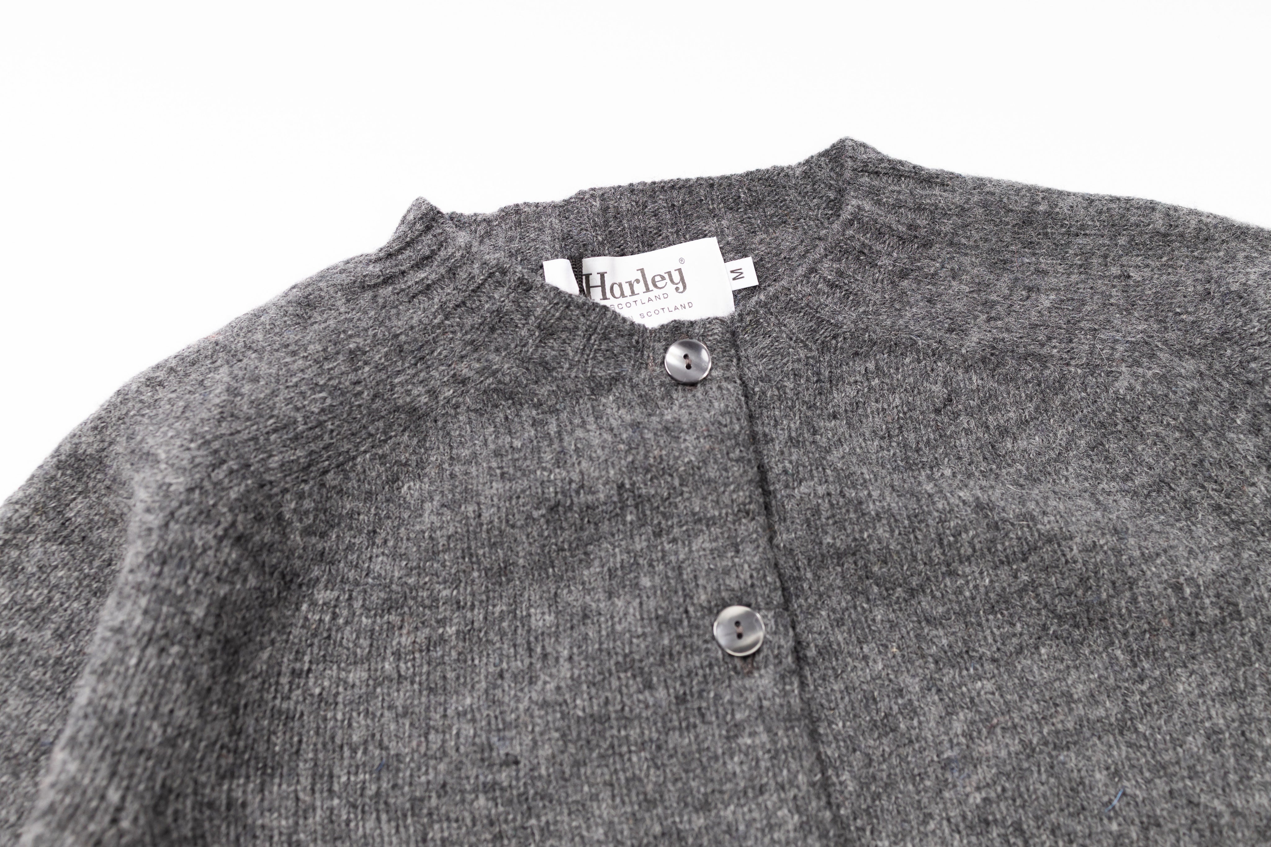 Grey cardigan on a white background