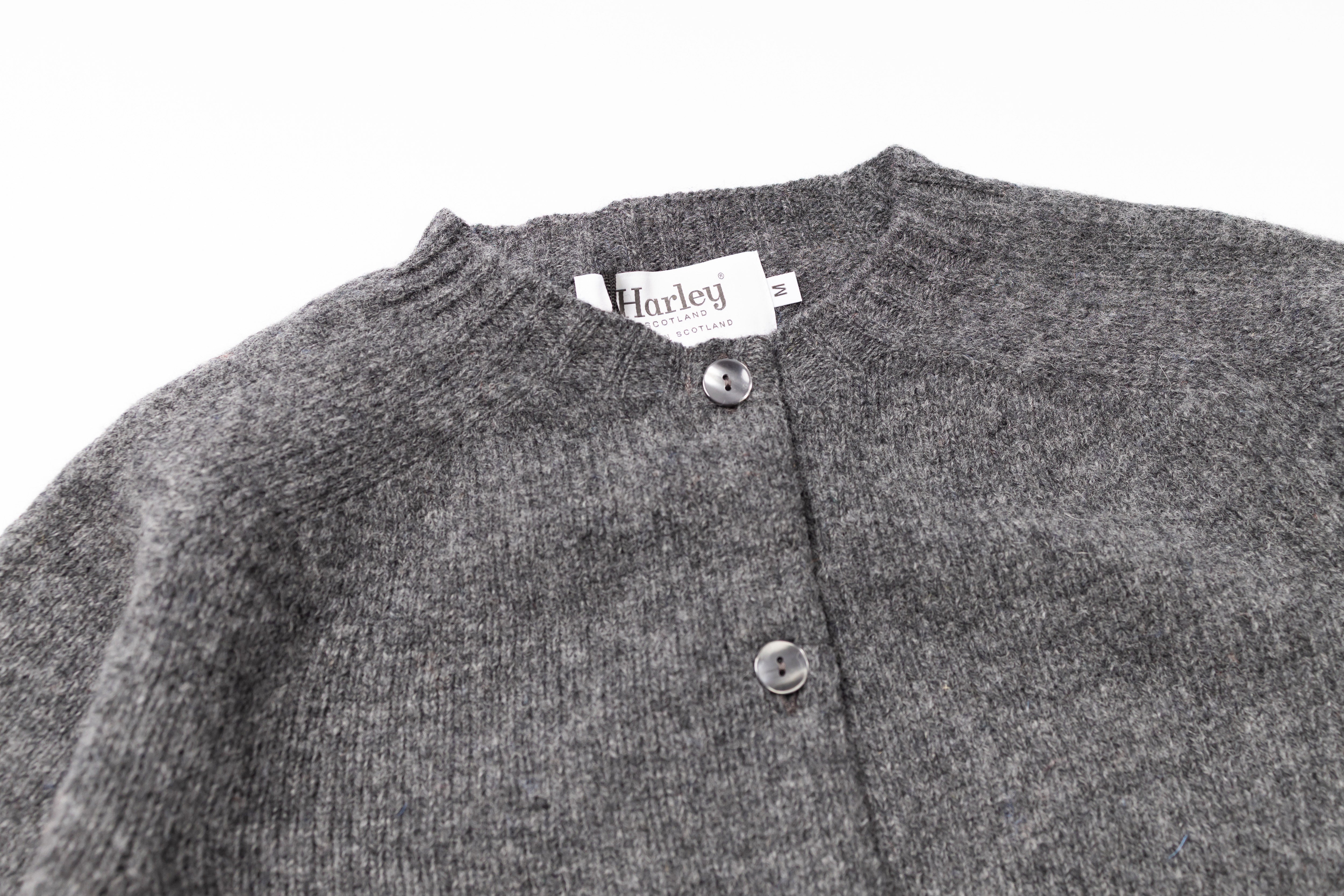 Grey cardigan on a white background