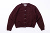 Burgundy cardigan on a white background