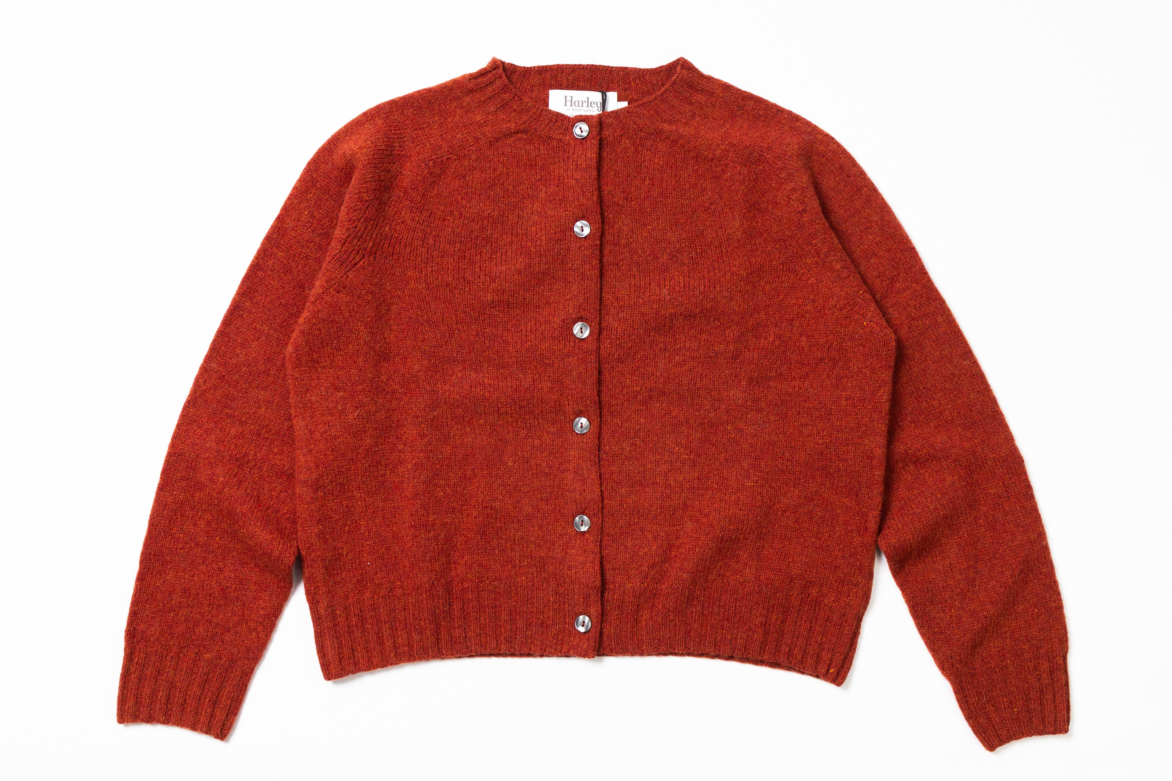 Red cardigan on a white background