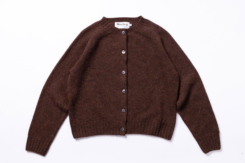 Brown cropped cardigan on a white background