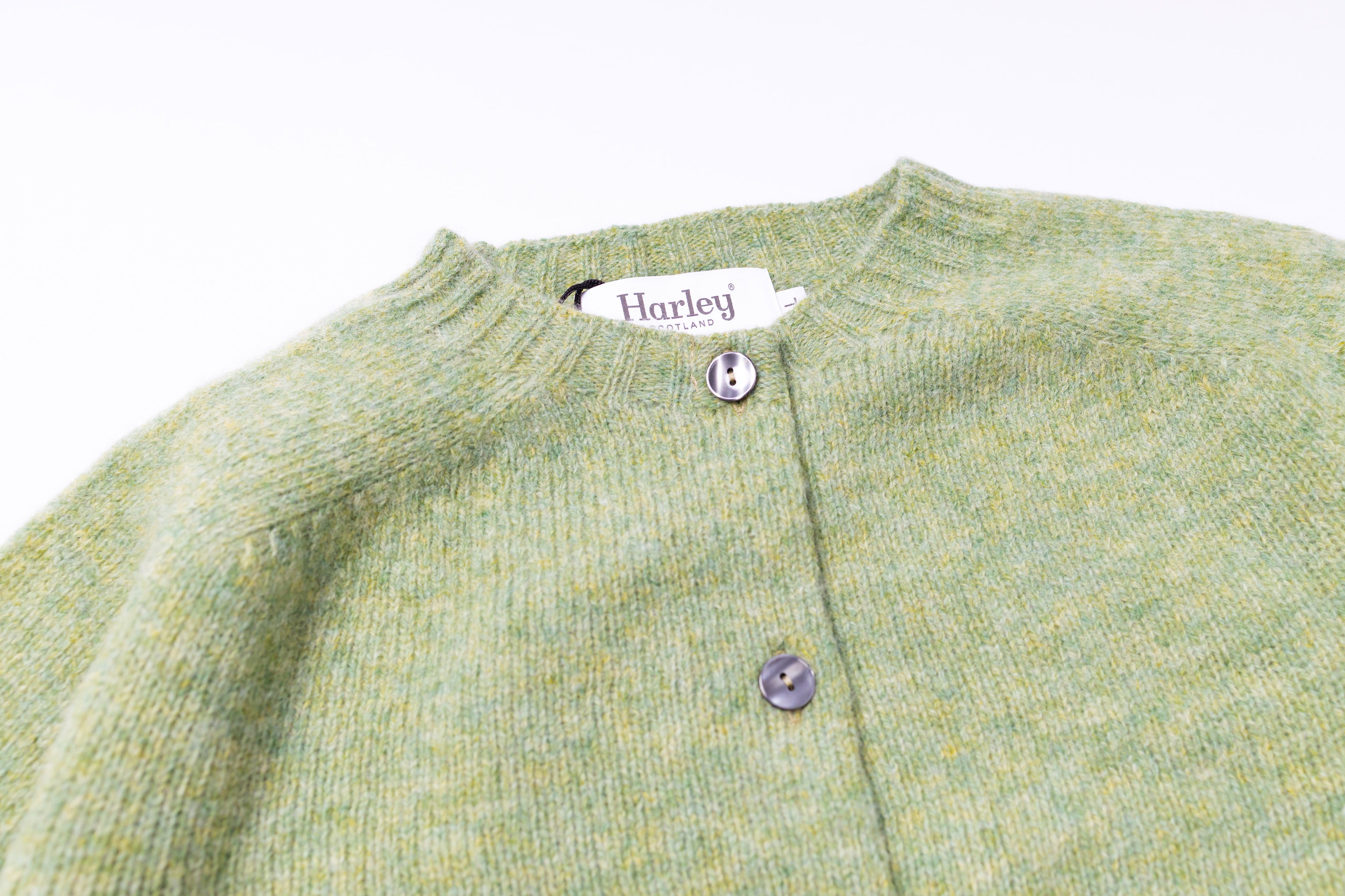 Light green cardigan on a white background