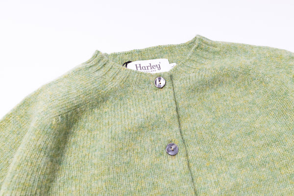 Light green cardigan on a white background