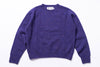 Purple sweater with 'Harley' label on a white background