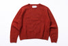 Red sweater with 'Harley' label on a white background