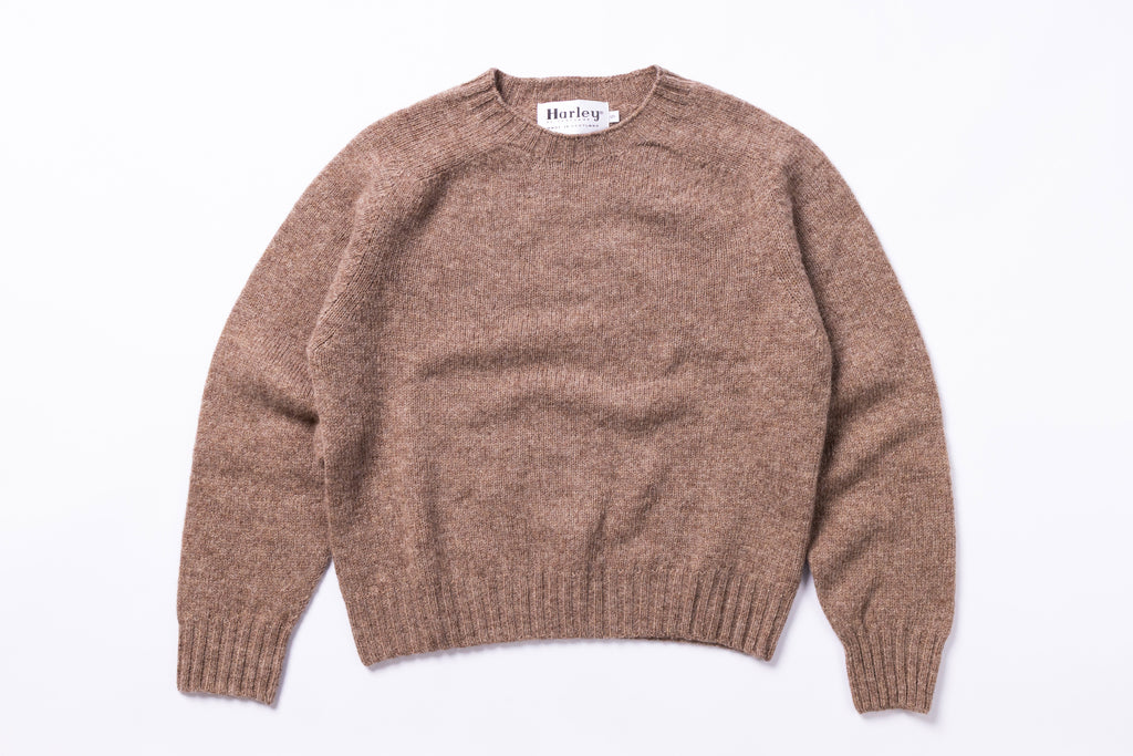 Light Brown sweater with 'Harley' label on a white background