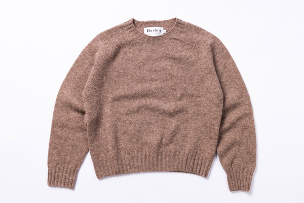 Light Brown sweater with 'Harley' label on a white background