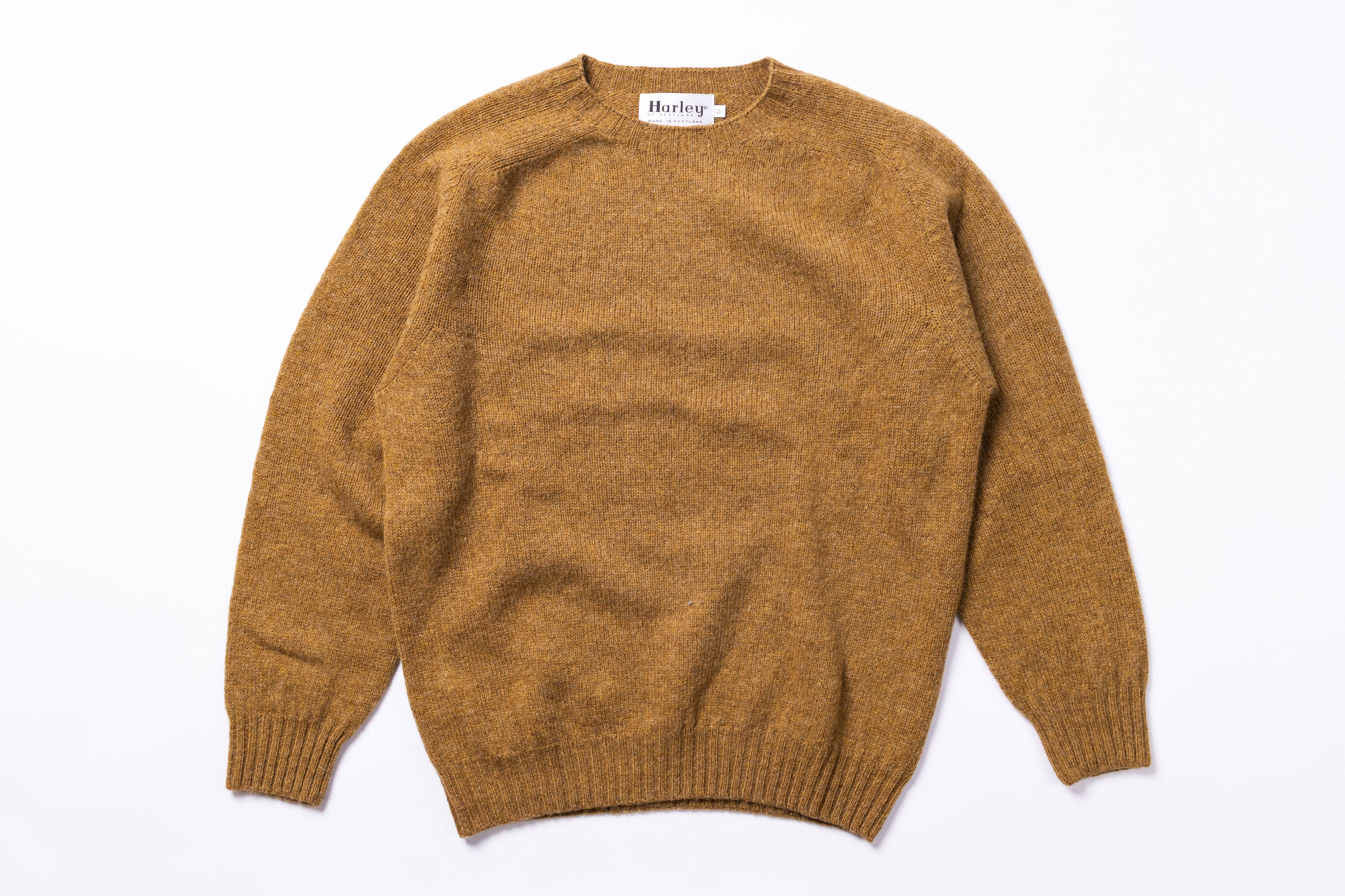 Yellow Jumper on a white background