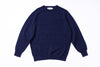 Navy blue sweater on a white background