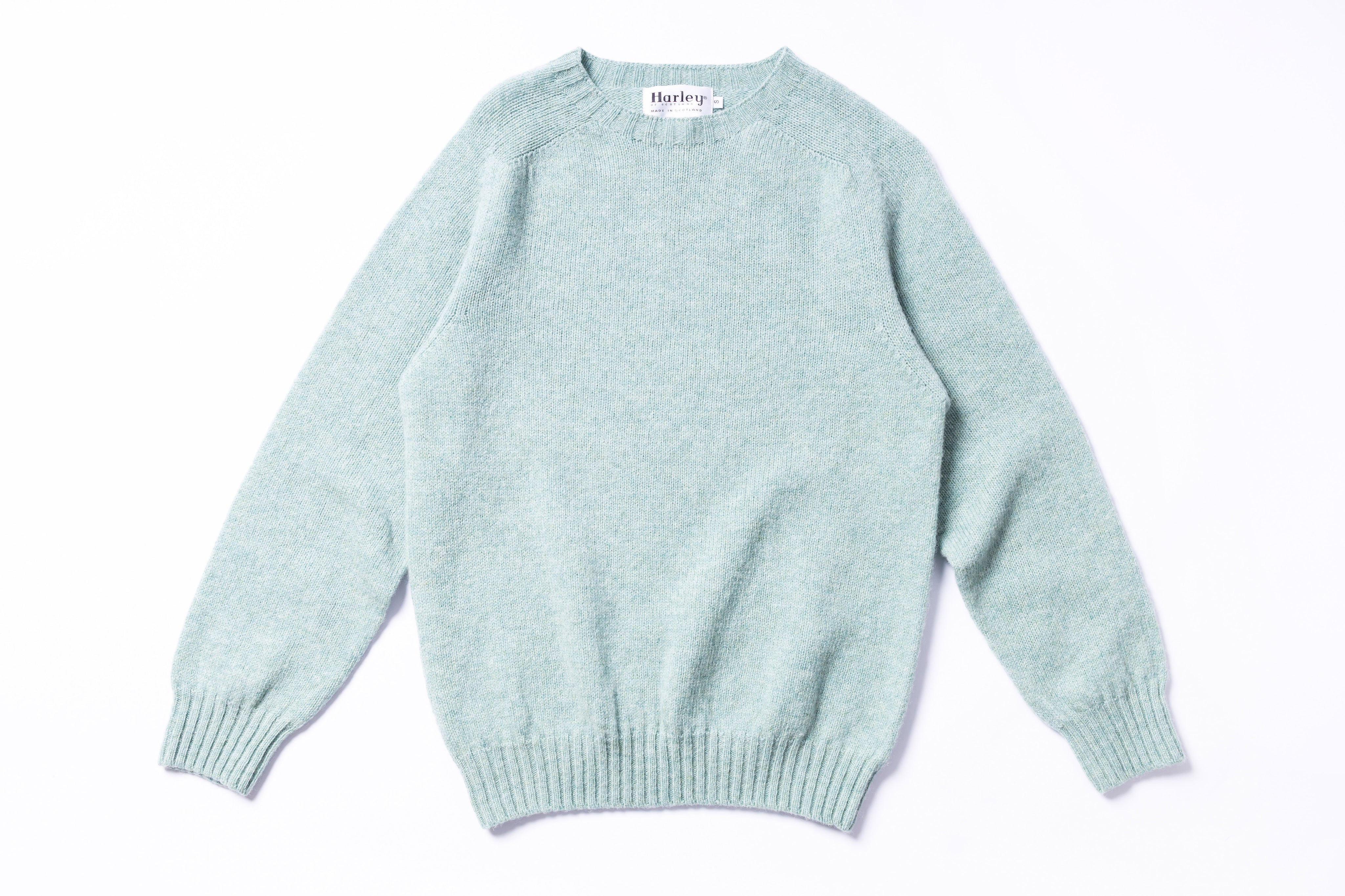 Light blue sweater on a white background