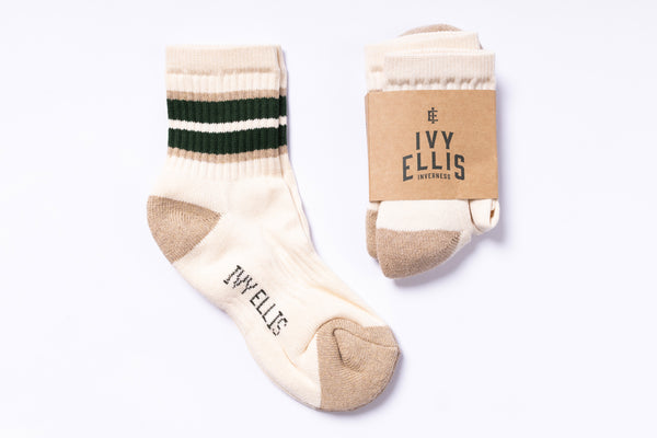 Pair of socks with 'Ivy Ellis' branding on a white background