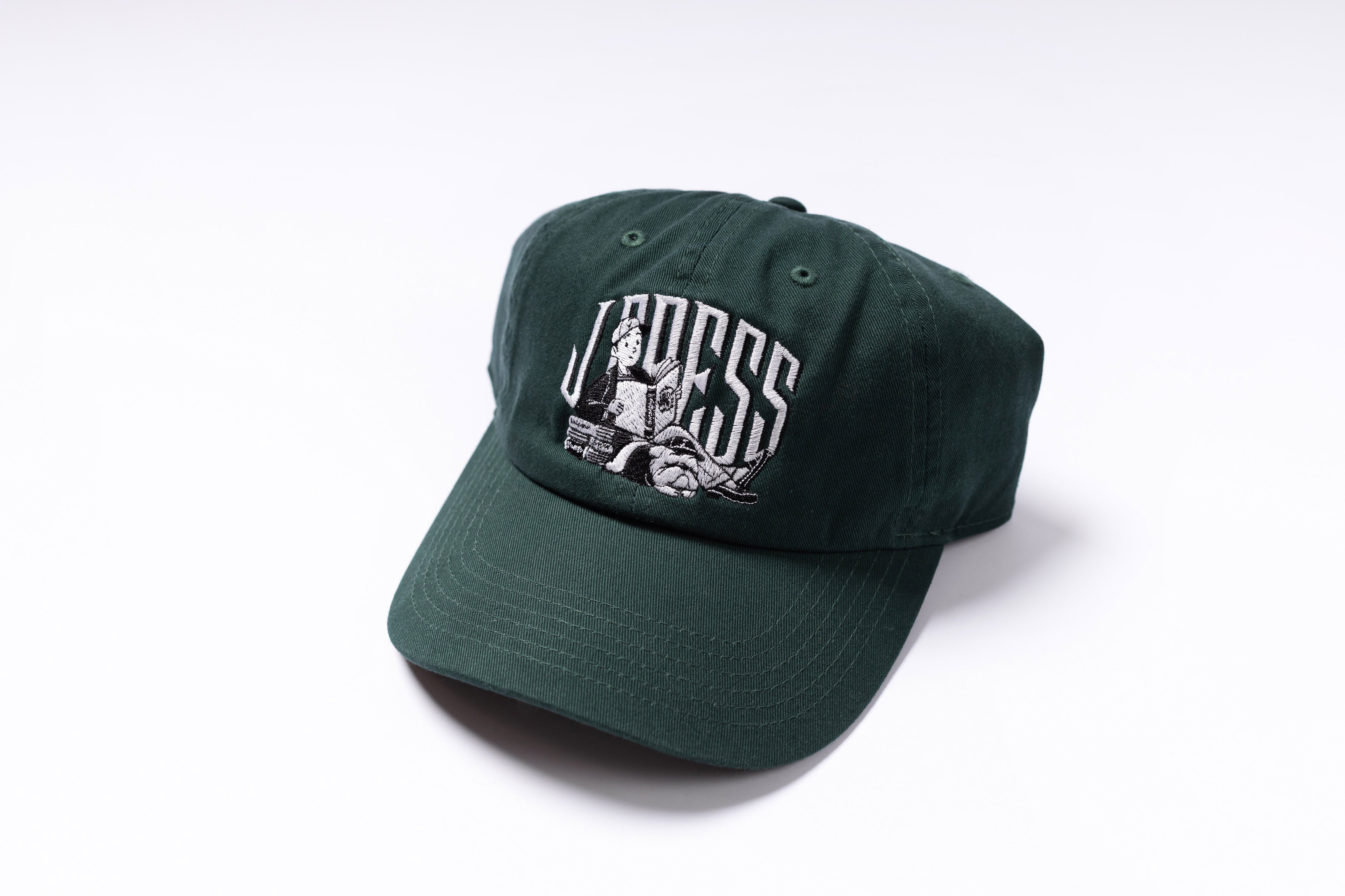 Green cap with a logo on a white background