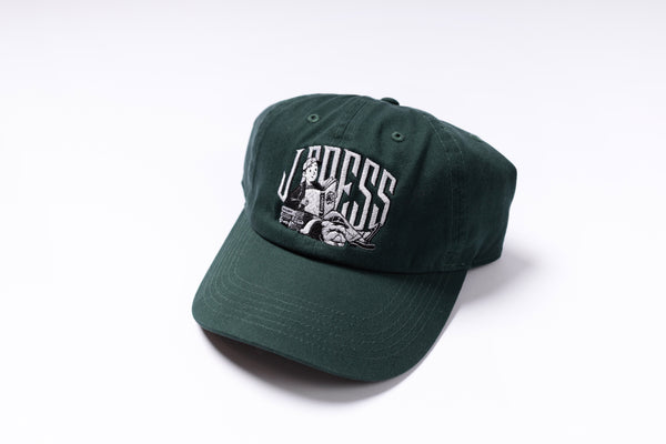 Green cap with a logo on a white background
