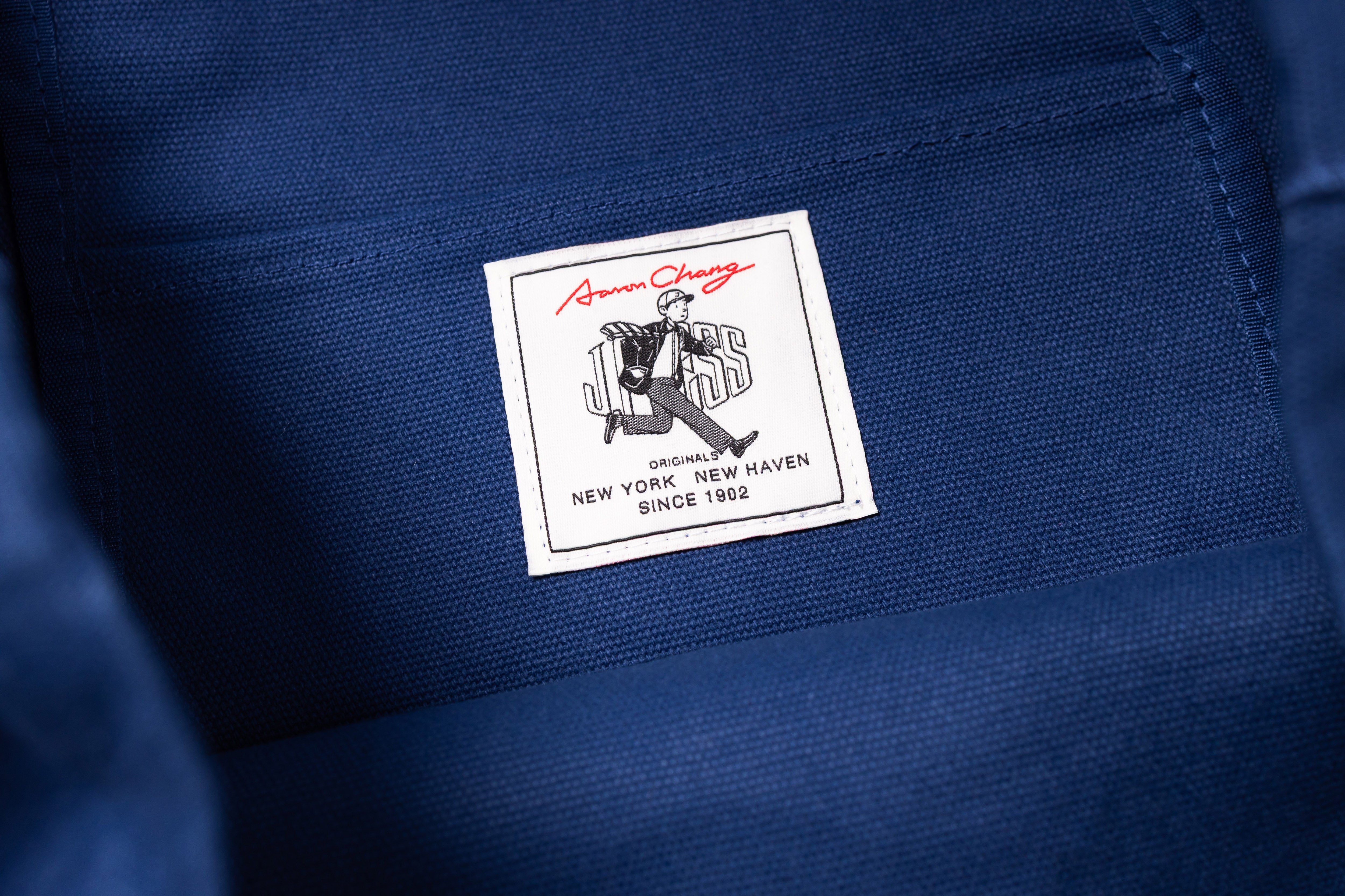 Close-up of a label on a blue fabric background