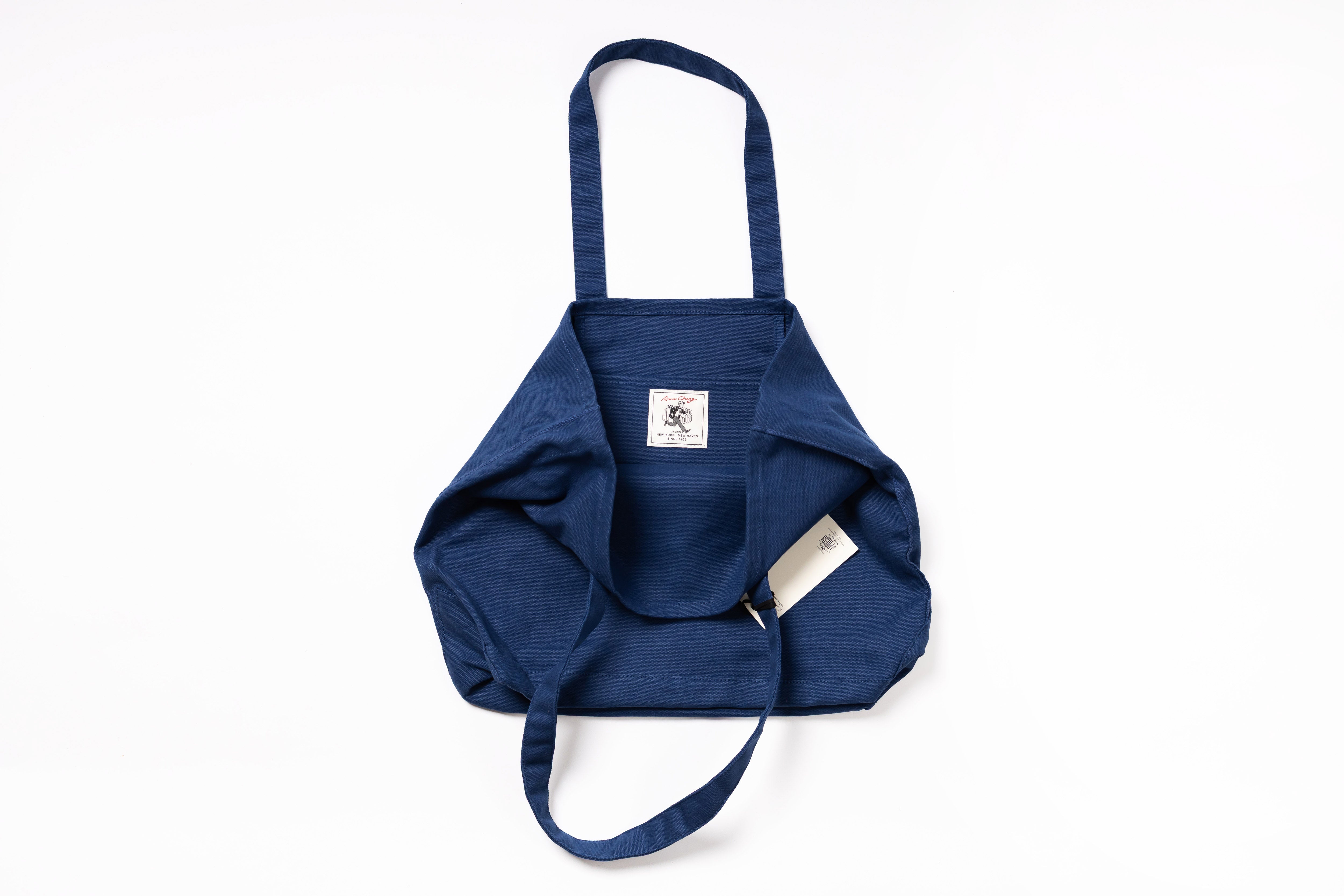 Blue carrier with a visible brand logo on a white background
