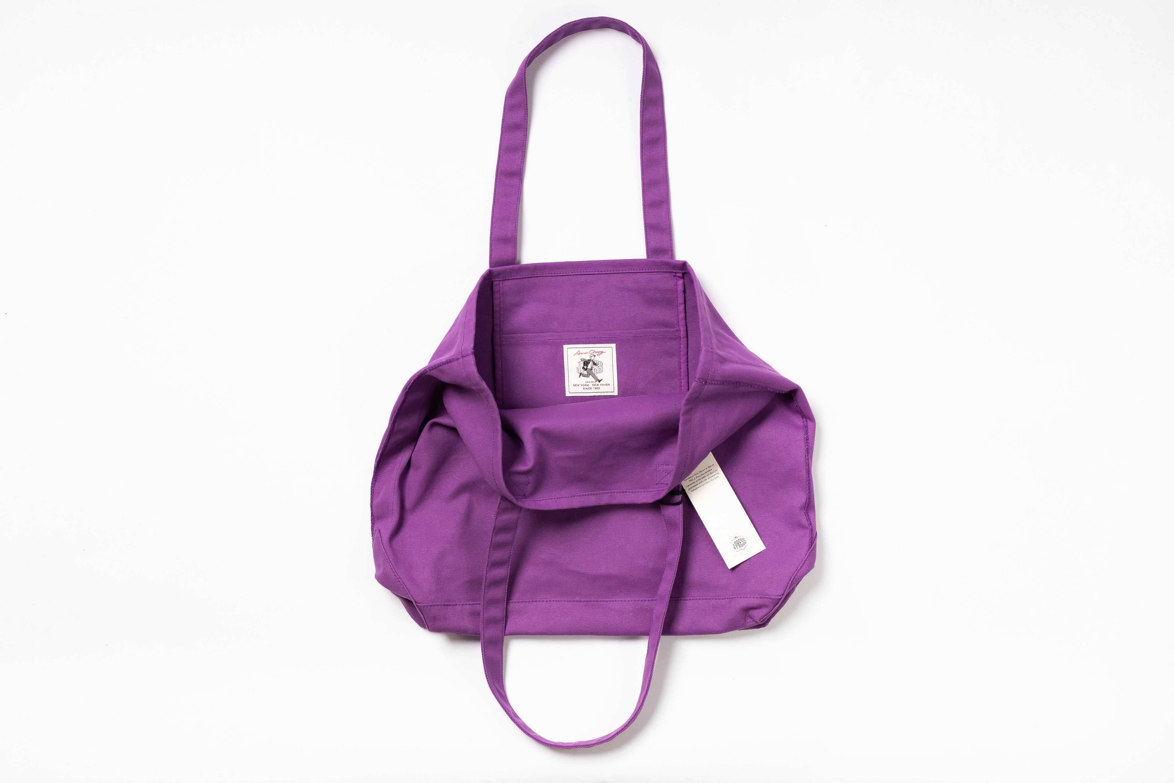 Purple bag with a visible brand logo on a white background