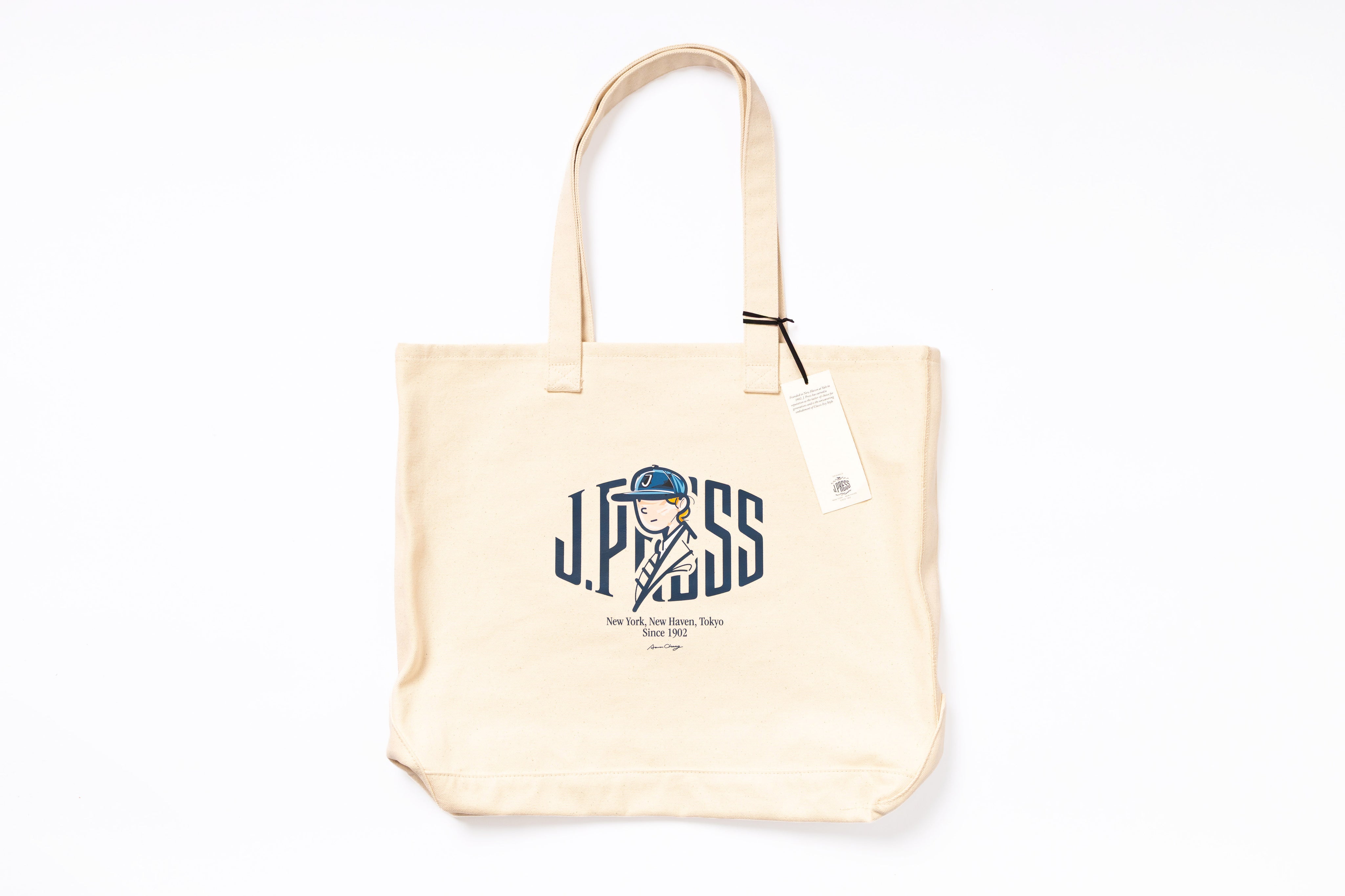 Beige tote bag with a logo and text on a white background