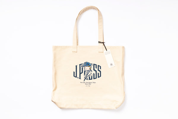 Beige tote bag with a logo and text on a white background