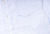 Close-up of a blue and white striped shirt with a pocket detail.