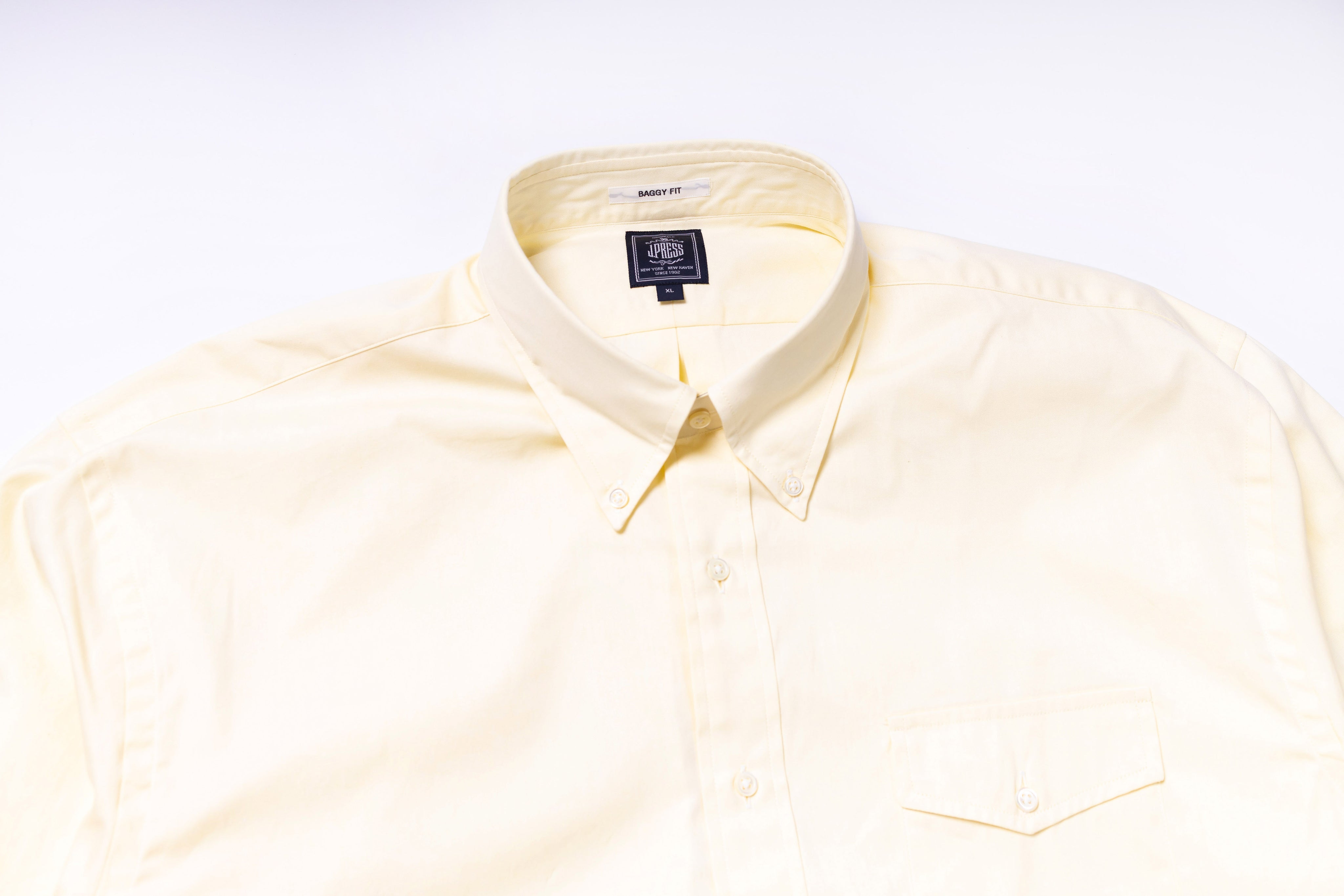 White dress shirt with a collar on a white background