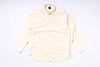 Light yellow button-up shirt on a white background