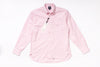 Pink shirt with a tag on a white background