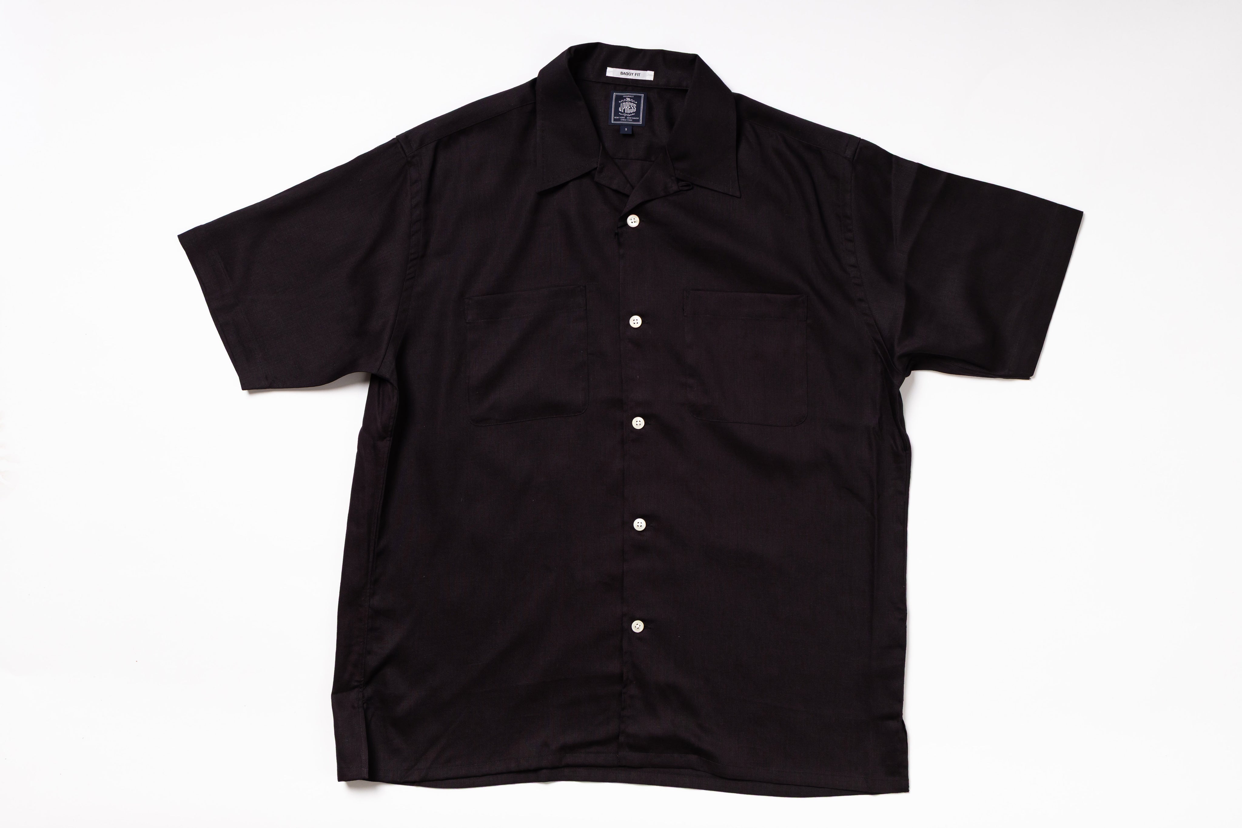 Black short-sleeve shirt on a white background