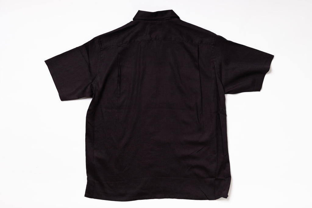 Black short-sleeve shirt on a white background