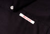 Close-up of a black fabric with a label indicating 'Japanese made fabric'.