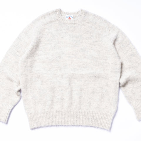 Light gray sweater on a white background