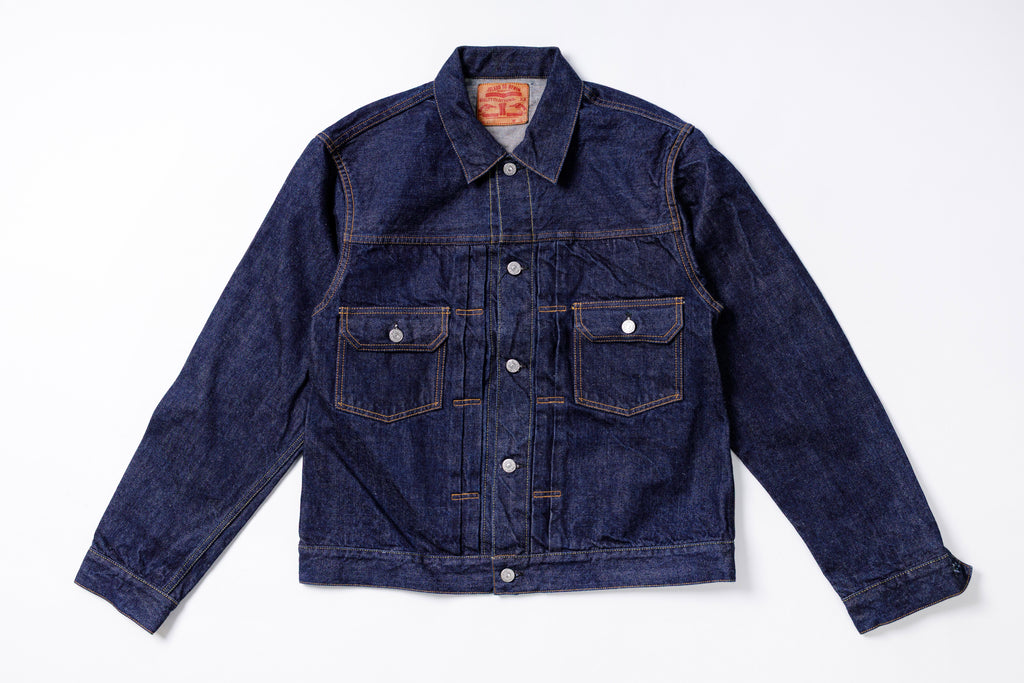 Blue denim jacket on a white background