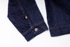 Close-up of a blue denim jacket on a white background