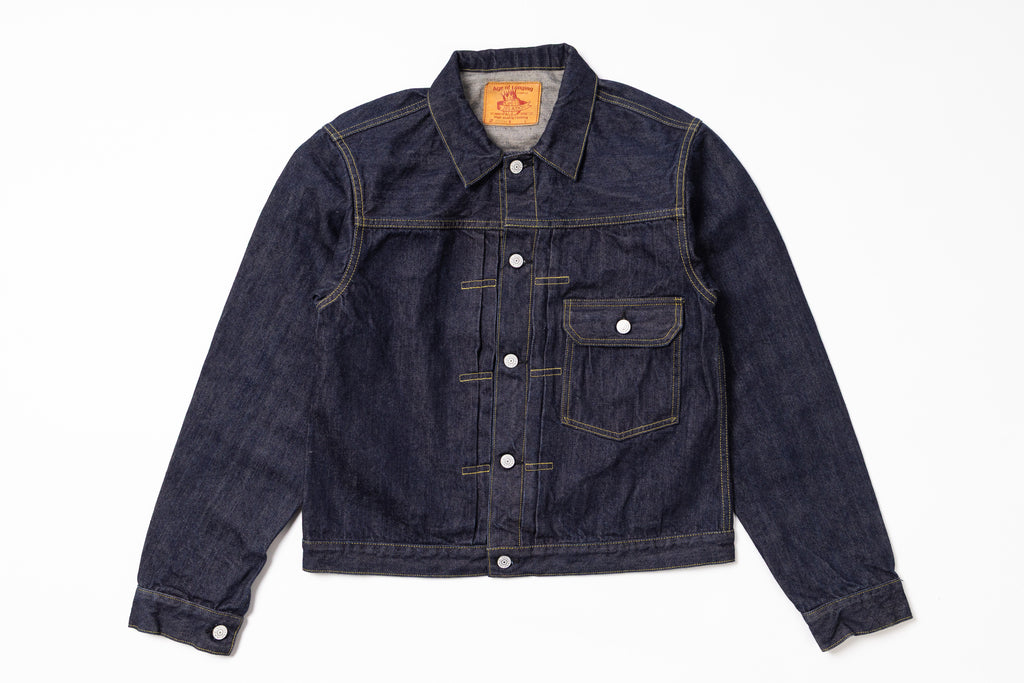 Dark blue denim jacket on a white background