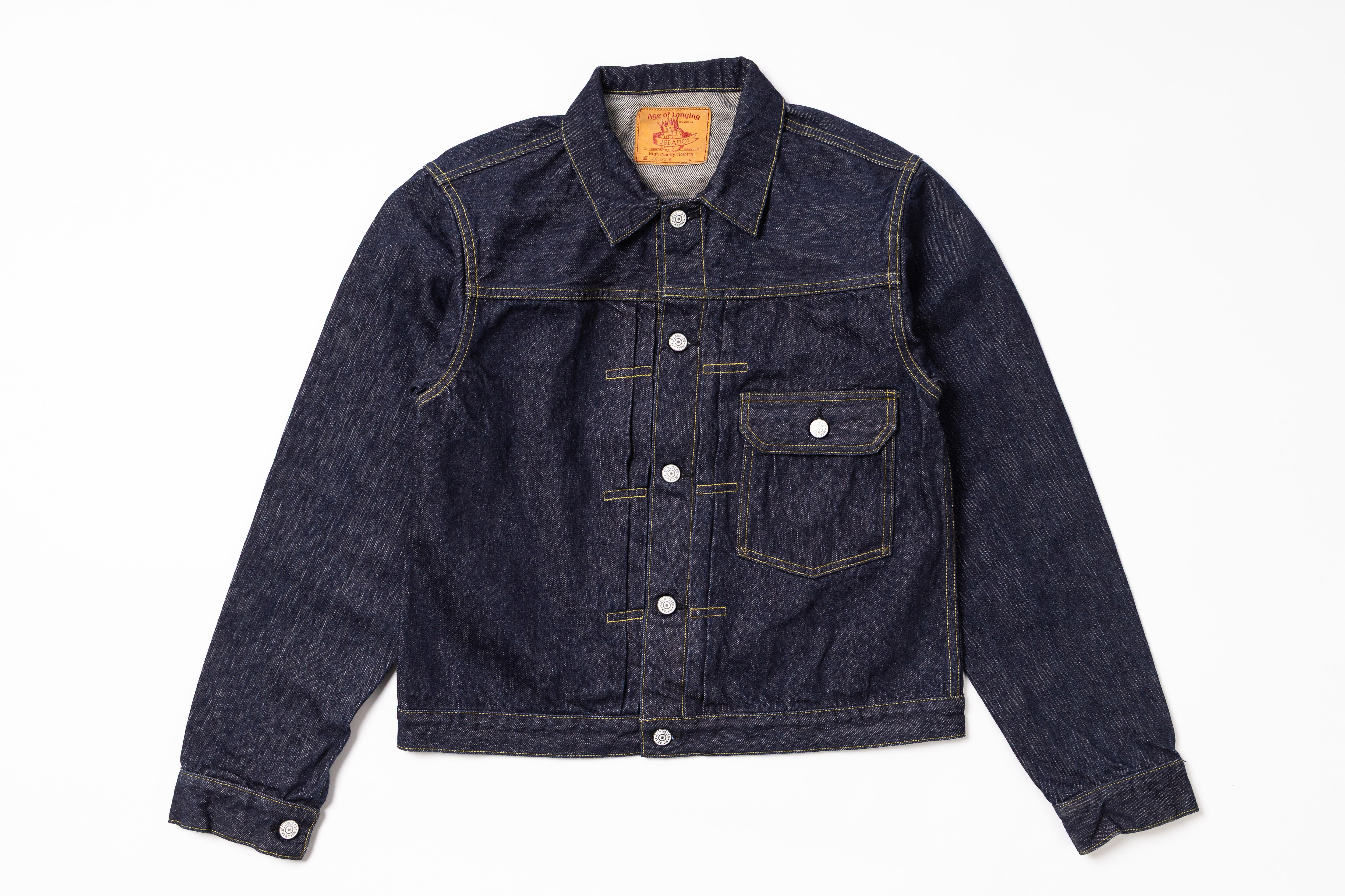 Dark blue denim jacket on a white background